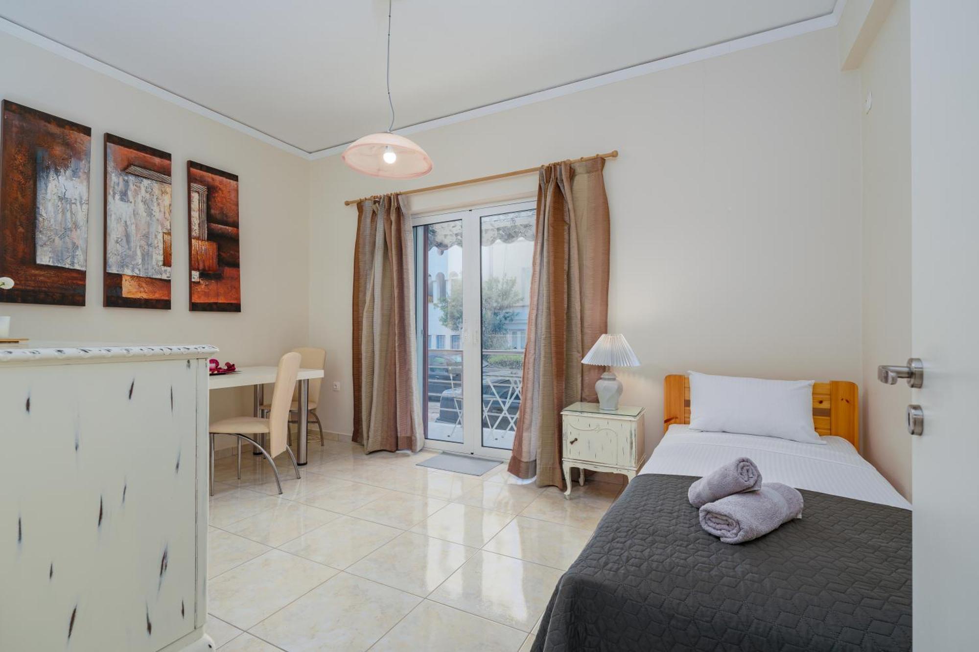 Nostos Apartment, With A Spacious Backyard Artemida  Esterno foto